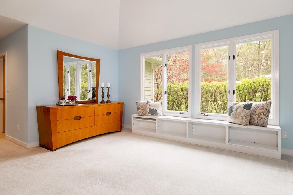 210 Elizabeth Ridge Road Carlisle, MA 01741 - Photo 18 of 25 a living room with furniture and a large window