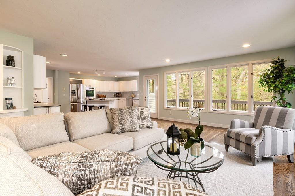 210 Elizabeth Ridge Road Carlisle, MA 01741 - Photo 8 of 25 a living room with furniture and a large window