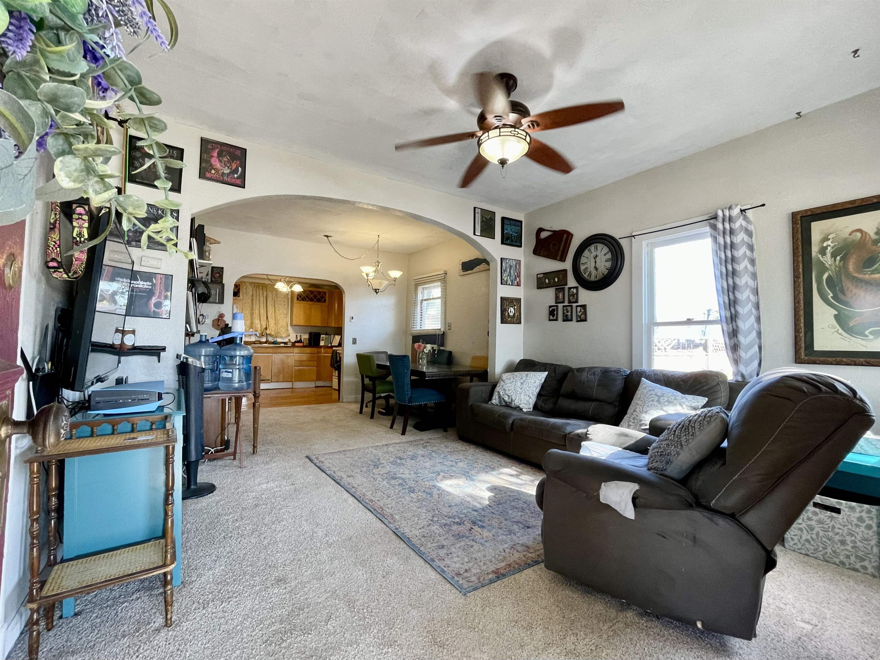 3246 D D 1/2 Road Clifton, CO 81520 - Photo 2 of 17 a living room with furniture and a flat screen tv