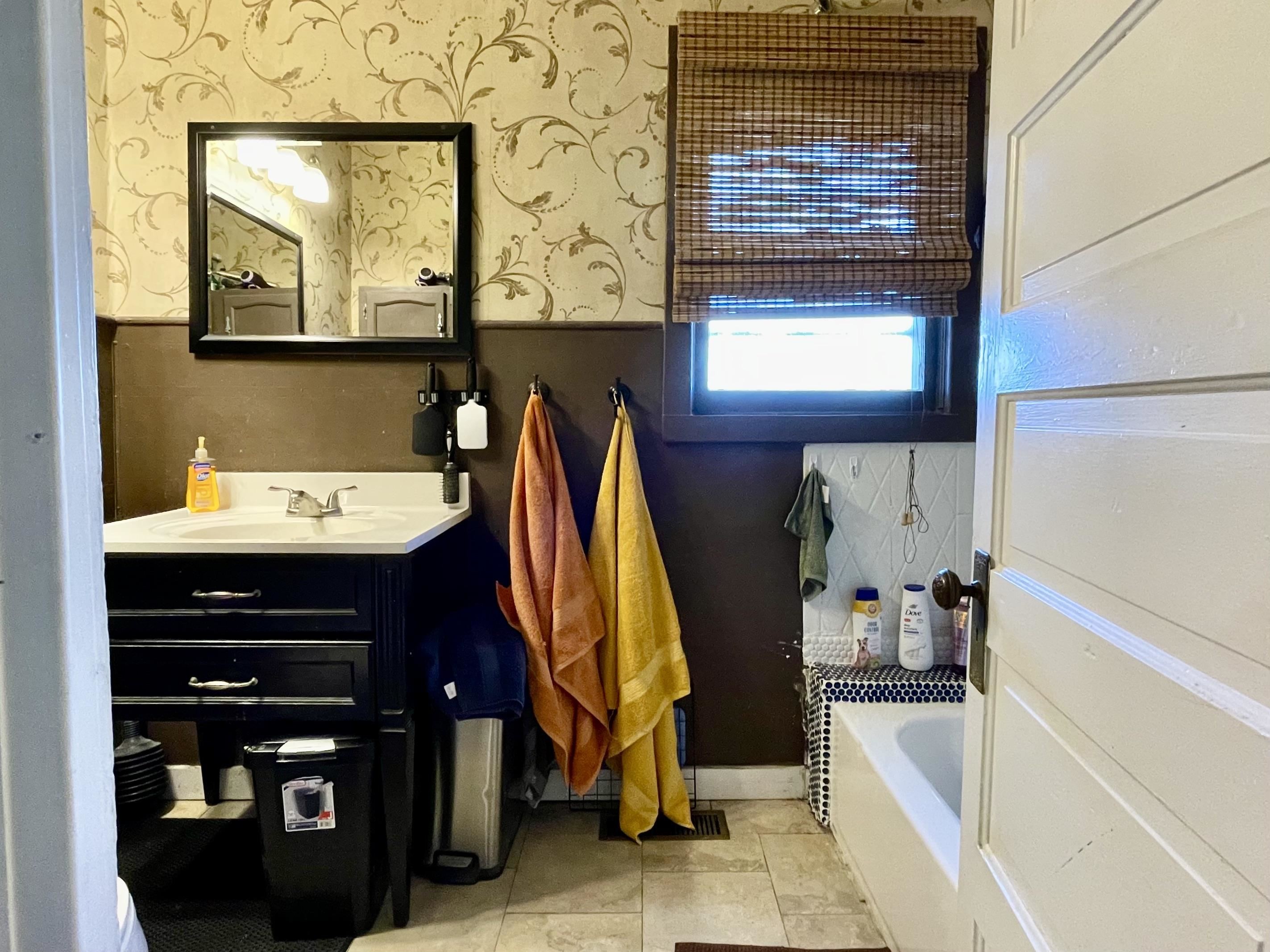 3246 D D 1/2 Road Clifton, CO 81520 - Photo 9 of 17 a bathroom with a sink and a mirror
