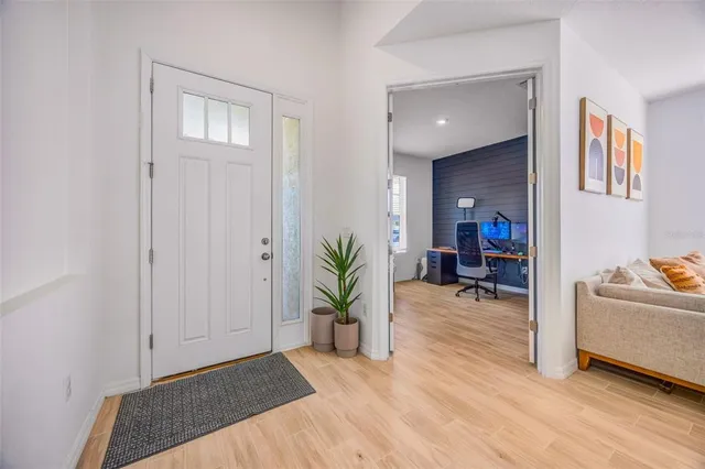a workspace with furniture hardwood and a window