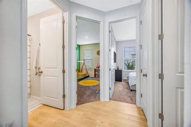 a view of a bedroom with baby toys