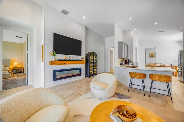 a view of a swimming pool with a lounge chairs
