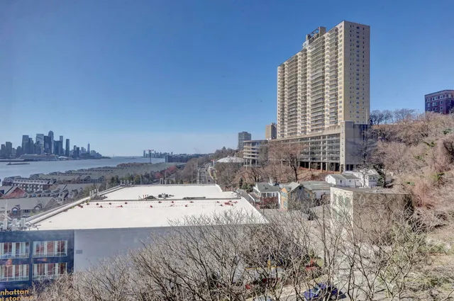 a view of a city with tall buildings