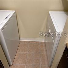 365 Forestway Circle, Unit 306 Altamonte Springs, FL 32701 - Photo 12 of 17 a view of walk in closet with clothes