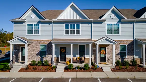a front view of a house with porch