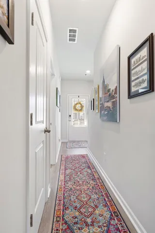 a view of a hallway with entryway