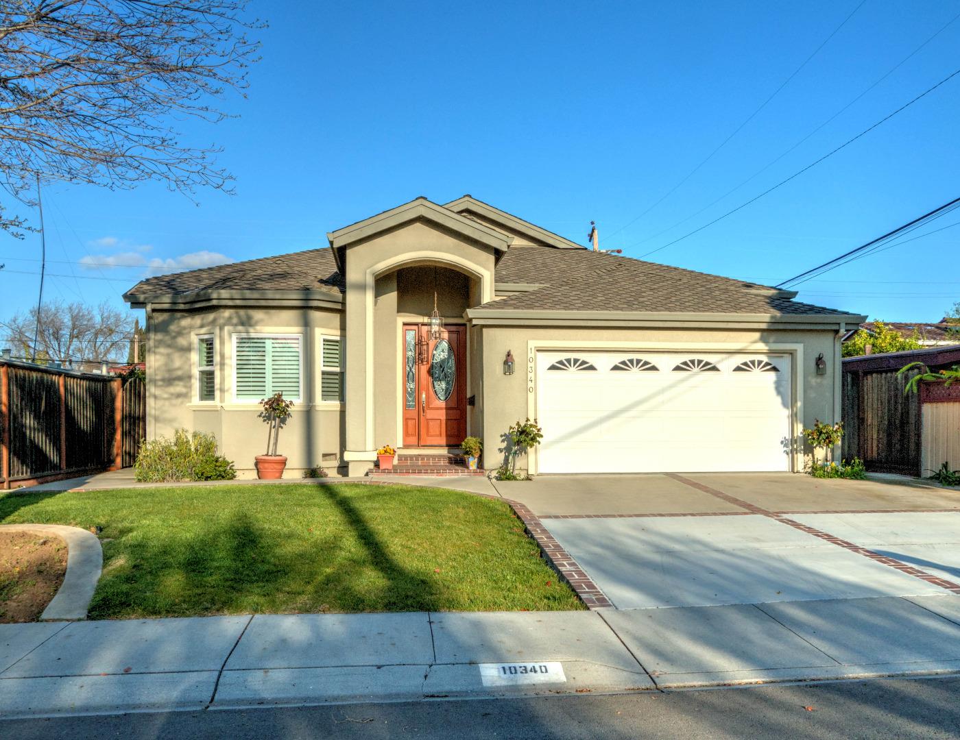 10340 Moretti Drive Cupertino, CA 95014 - Photo 1 of 18 a front view of a house with yard