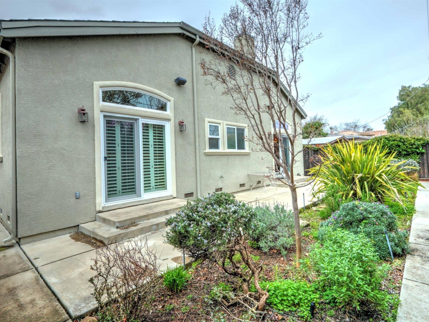 10340 Moretti Drive Cupertino, CA 95014 - Photo 17 of 18 a front view of a house with garden