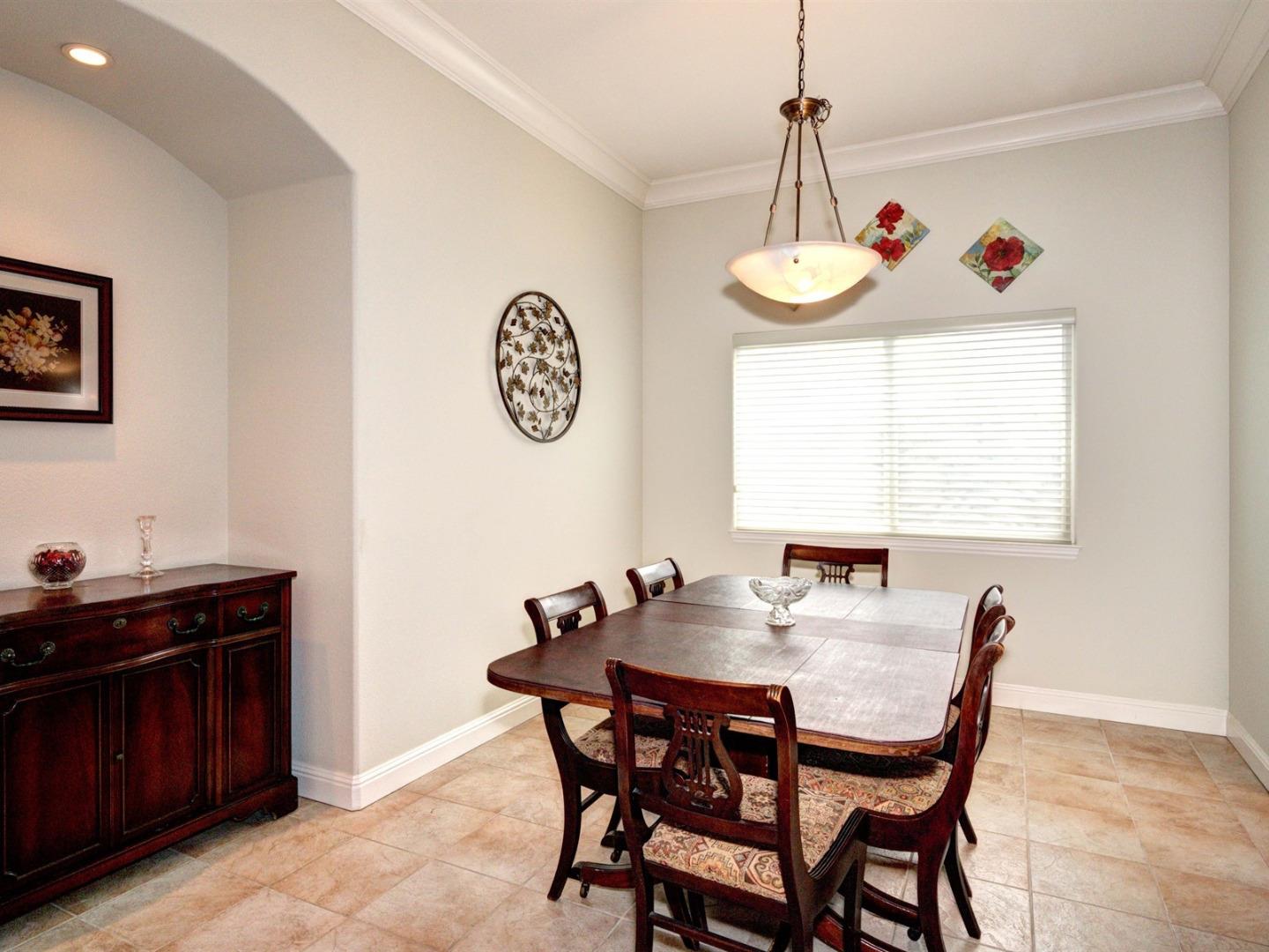 10340 Moretti Drive Cupertino, CA 95014 - Photo 6 of 18 a view of a dining room and a table