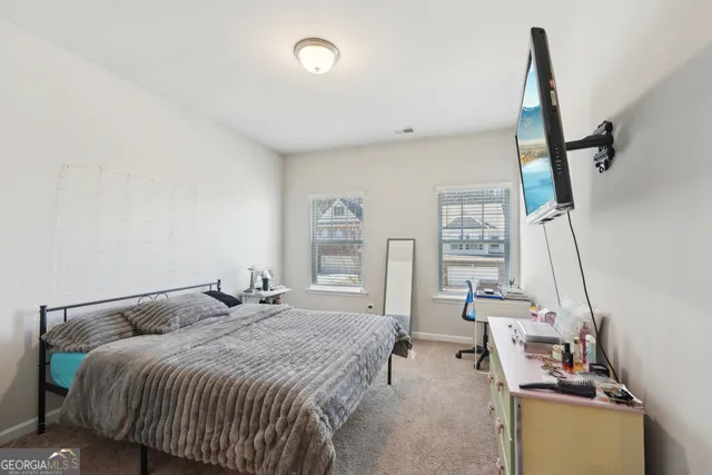 a potted plant sitting in a room next to a window