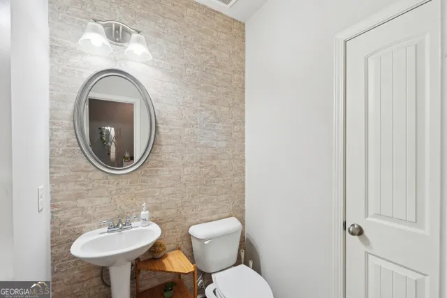 a view of a workspace with furniture