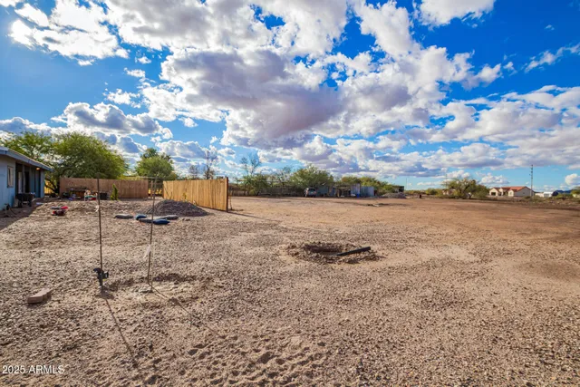 a view of an ocean beach and a building