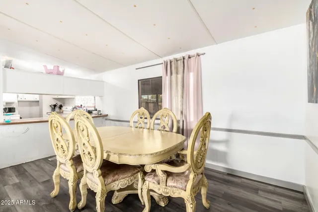 a view of an empty room with windows