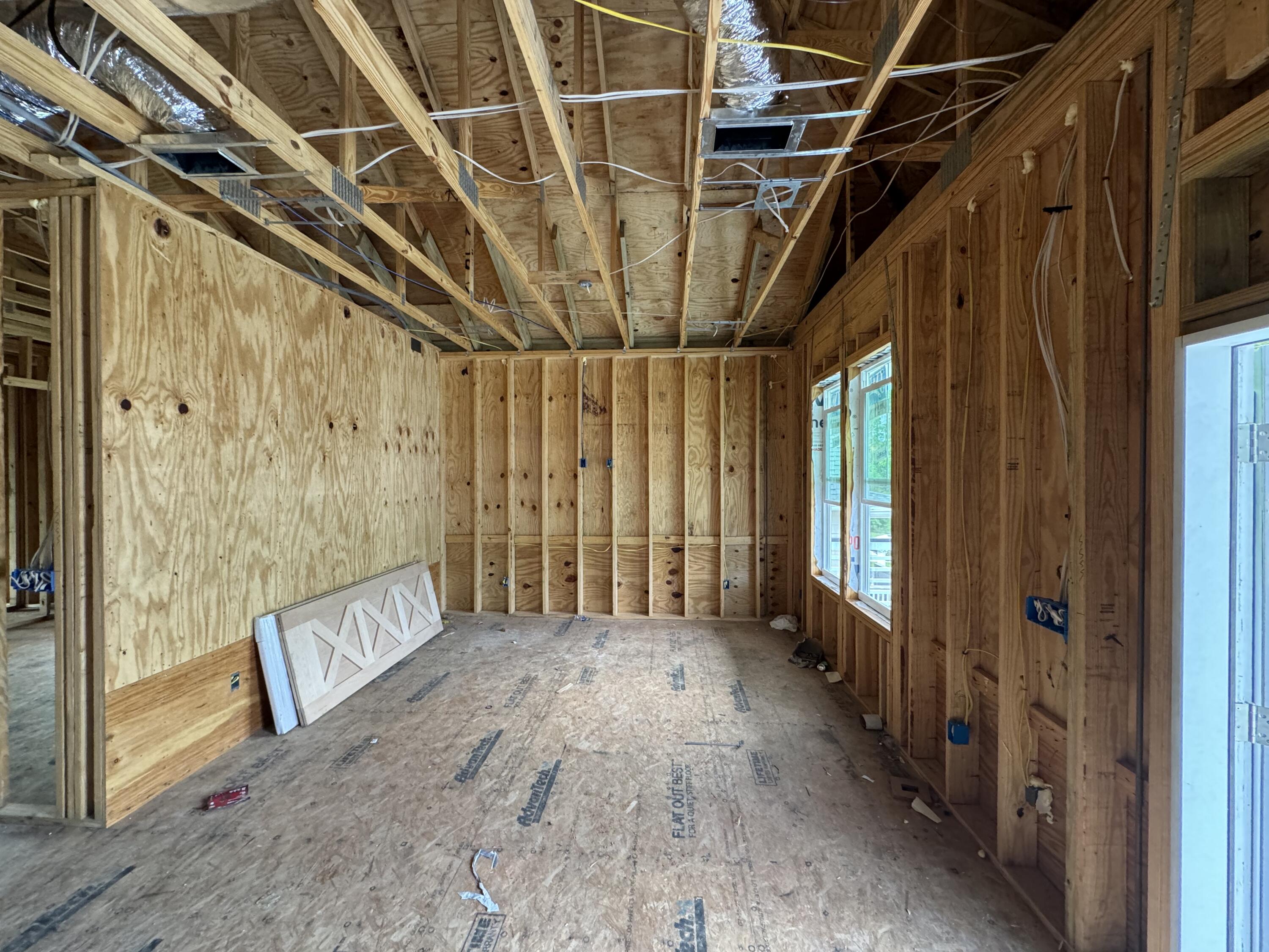 179 6th Street Santa Rosa Beach, FL 32459 - Photo 7 of 11 a view of entryway with wooden floor