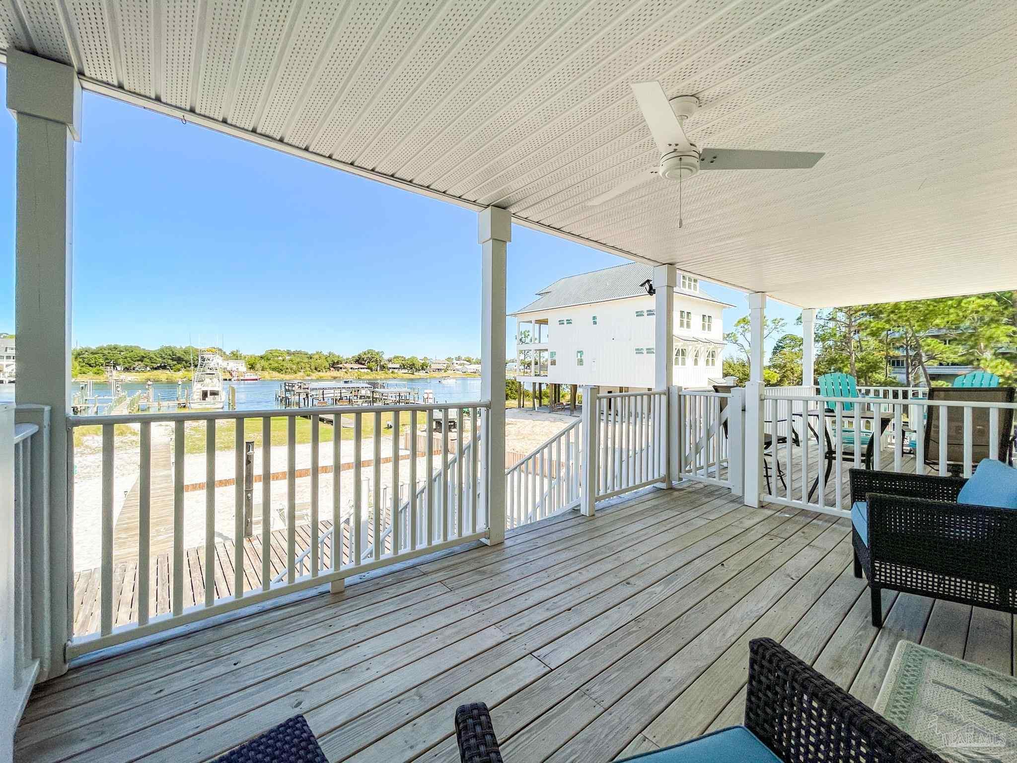 13948 River Road, Unit 3A Pensacola, FL 32507 - Photo 17 of 47 a view of a balcony with wooden floor