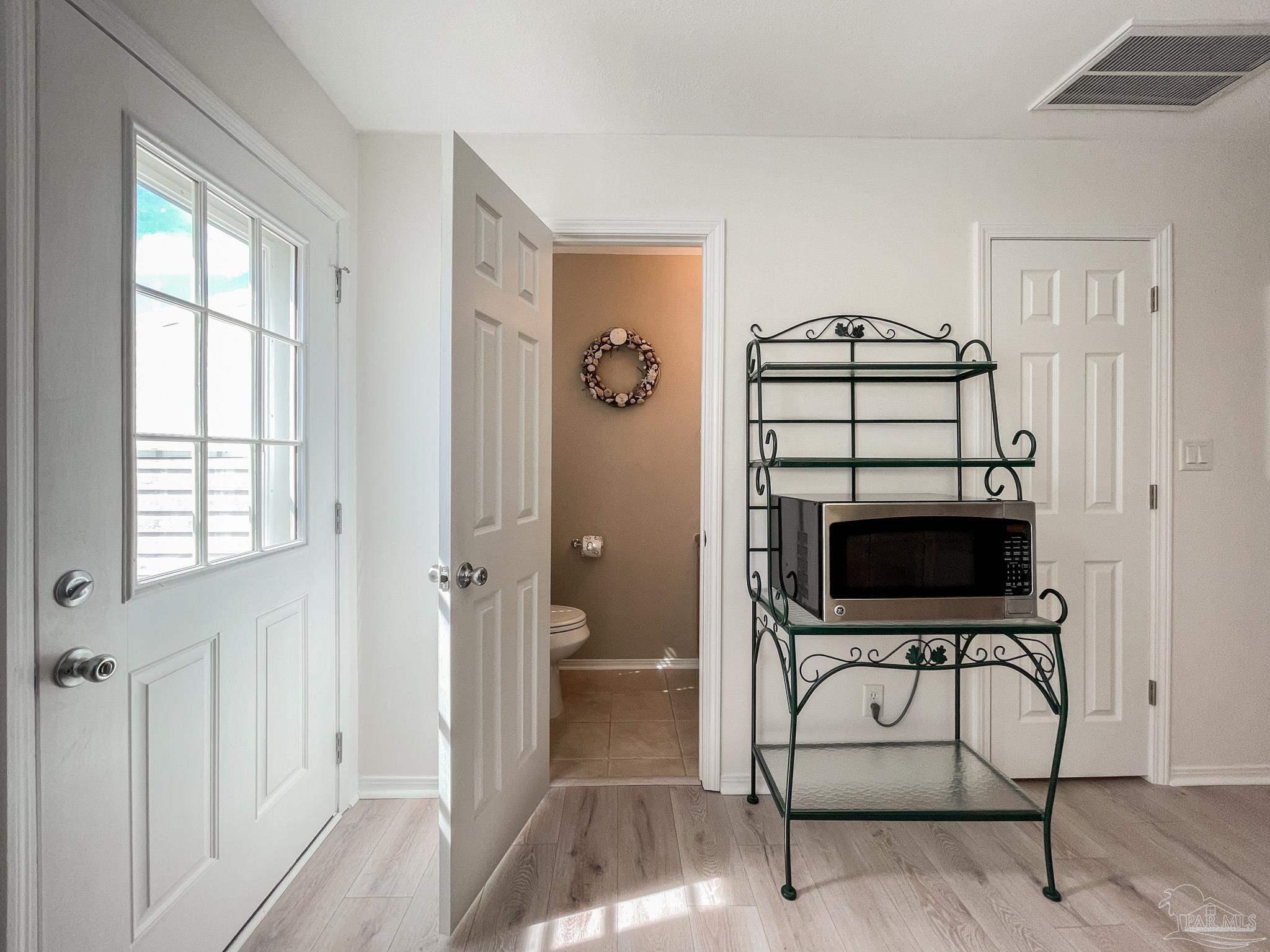 13948 River Road, Unit 3A Pensacola, FL 32507 - Photo 24 of 47 a view of a livingroom with furniture and a window