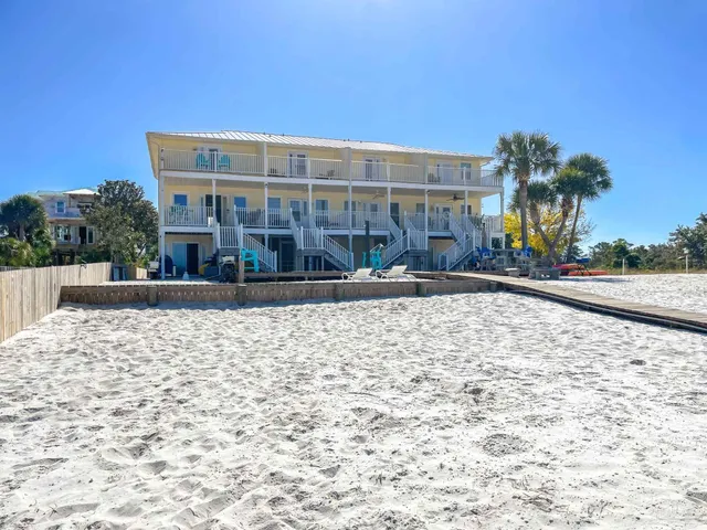 a view of a building with a yard