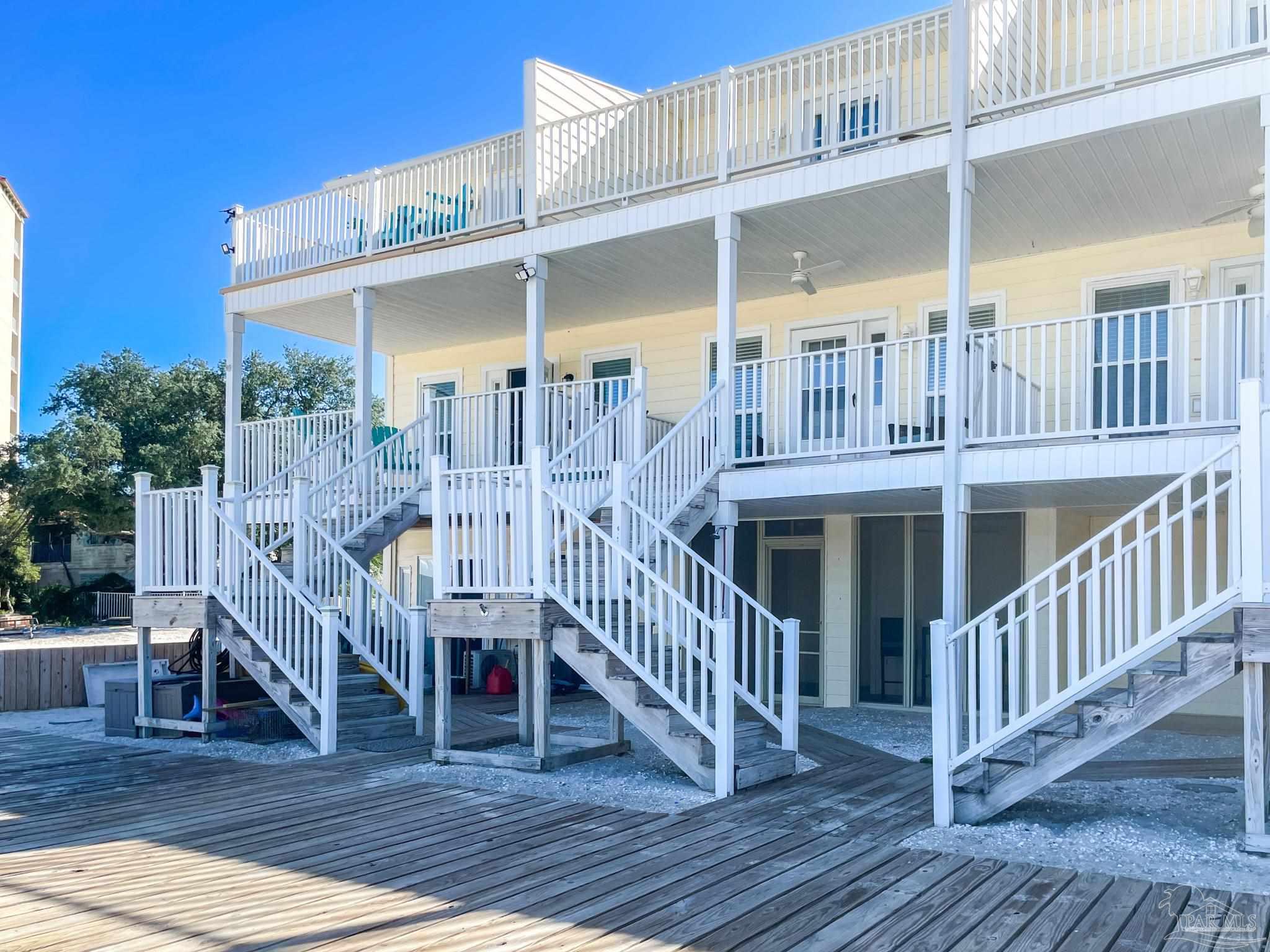 13948 River Road, Unit 3A Pensacola, FL 32507 - Photo 8 of 47 a view of a house with a deck