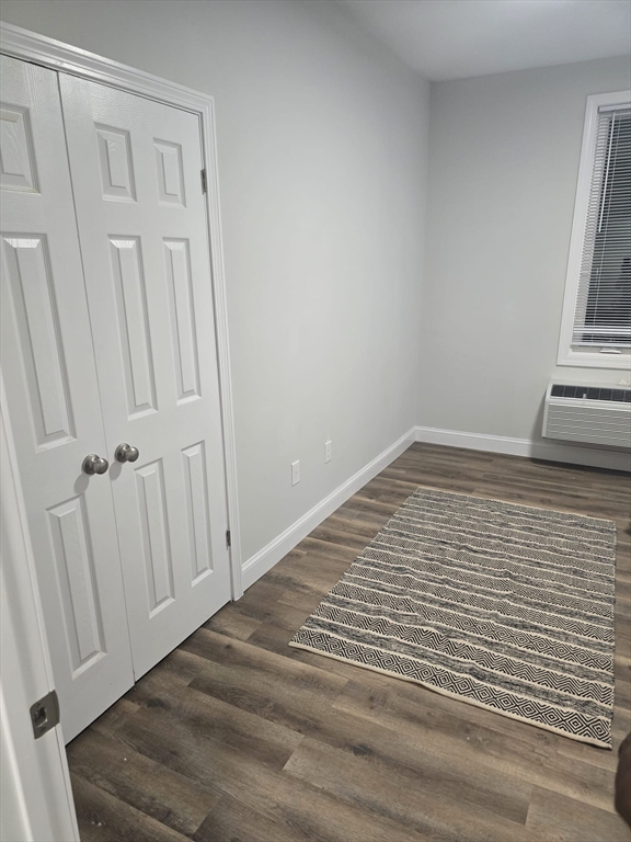304 Warren Street, Unit 3L Boston, MA 02119 - Photo 6 of 9 a view of a livingroom with wooden floor