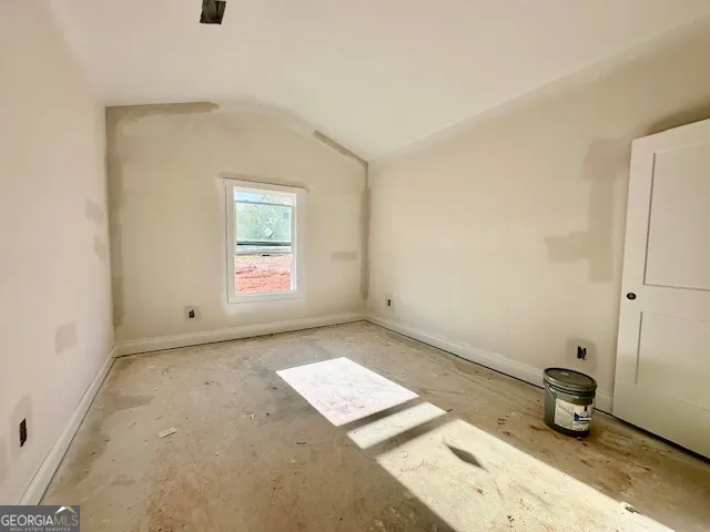 an empty room with a natural light