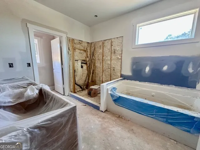 an empty room with windows