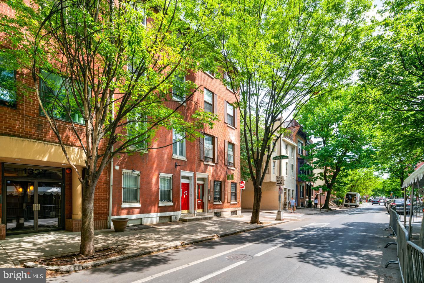1333 Pine Street, Unit 4F Philadelphia, PA 19107 - Photo 19 of 20 a view of a building with a trees