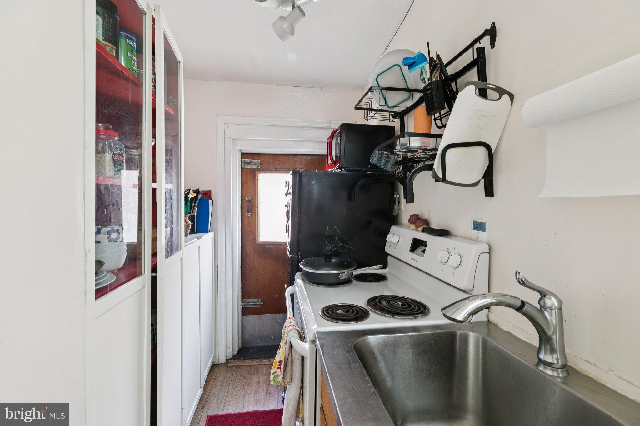 1333 Pine Street, Unit 4F Philadelphia, PA 19107 - Photo 8 of 20 a room with storage and utility