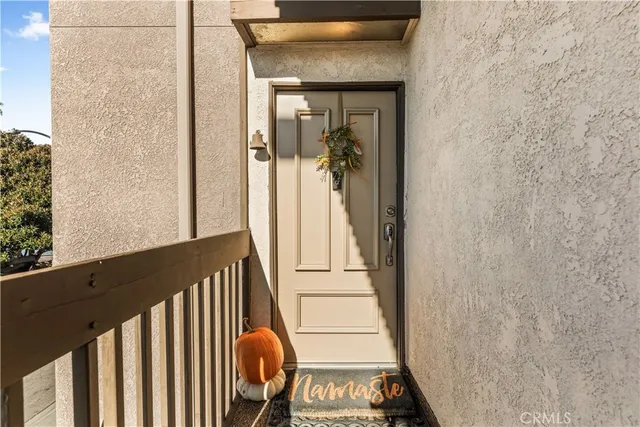 a view of balcony with wooden floor