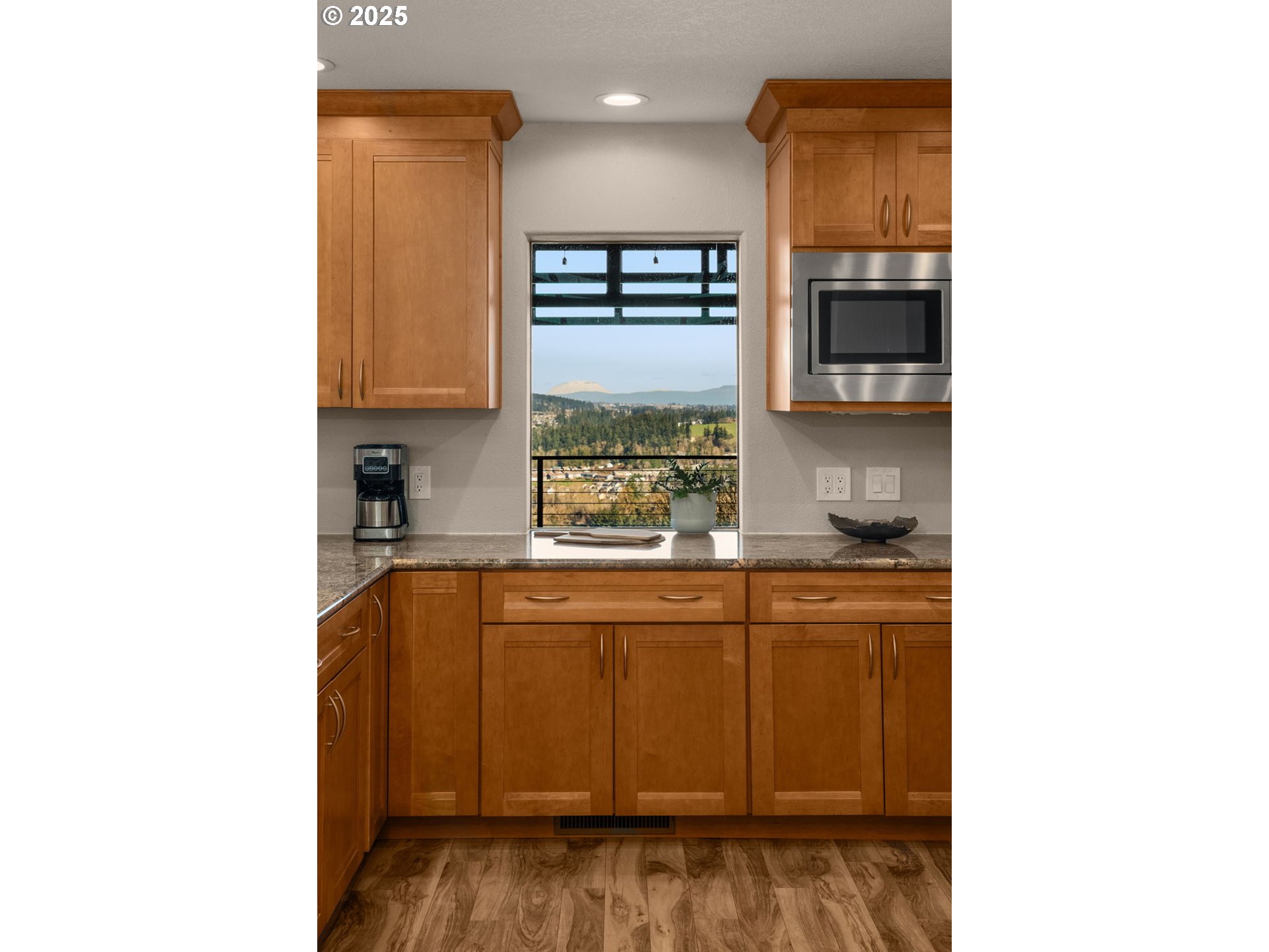 17287 South Overlook Road Oregon City, OR 97045 - Photo 17 of 48 a kitchen with a sink and cabinets