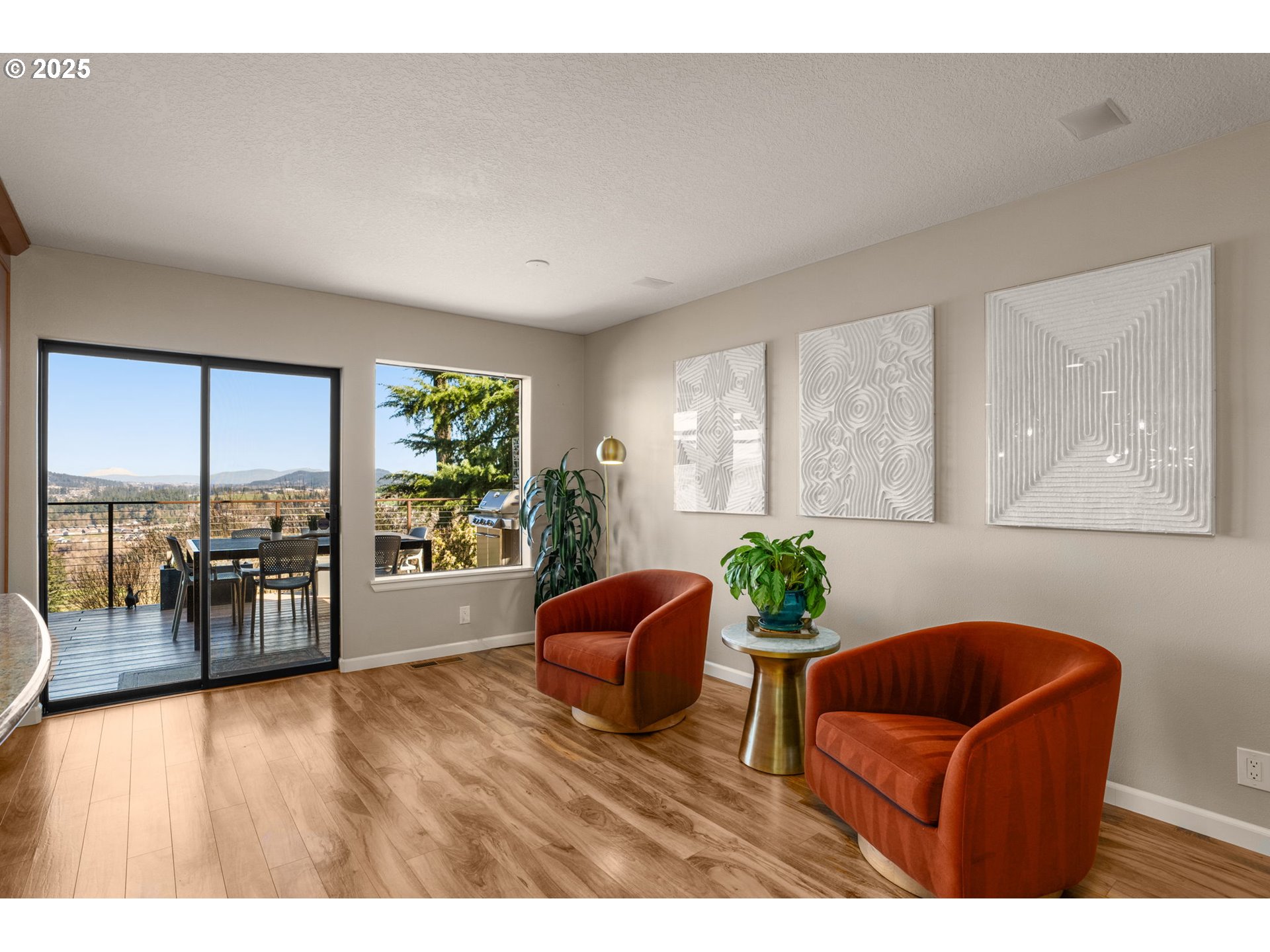 17287 South Overlook Road Oregon City, OR 97045 - Photo 19 of 48 a living room with furniture and large windows