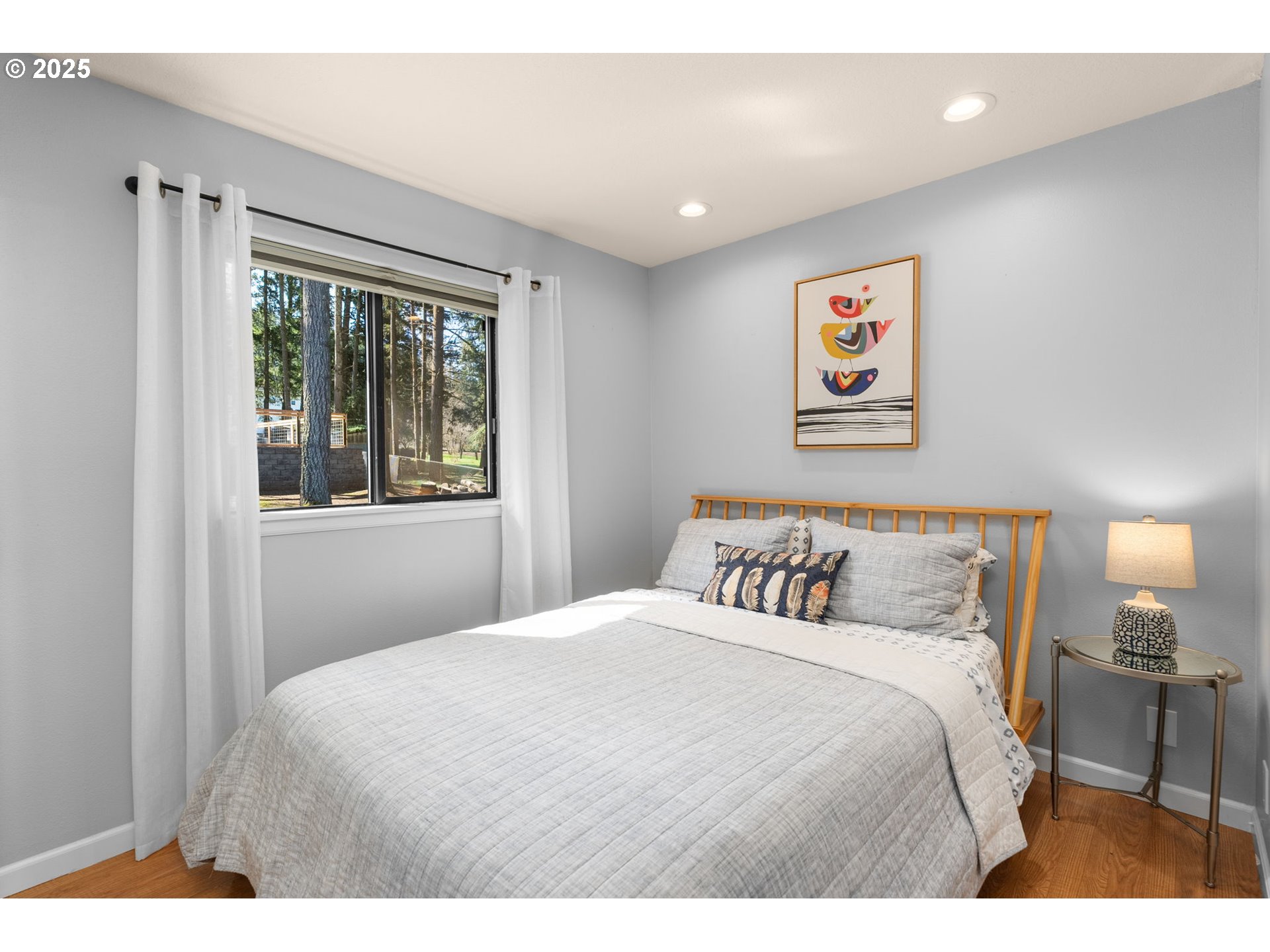 17287 South Overlook Road Oregon City, OR 97045 - Photo 20 of 48 a bedroom with a bed and a painting on the wall