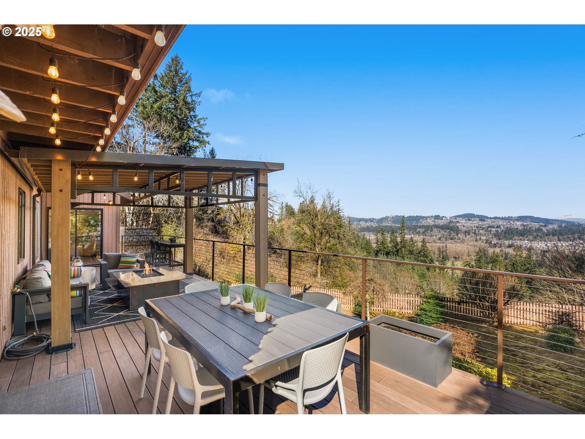 17287 South Overlook Road Oregon City, OR 97045 - Photo 23 of 48 a view of a balcony with lake view and a potted plant