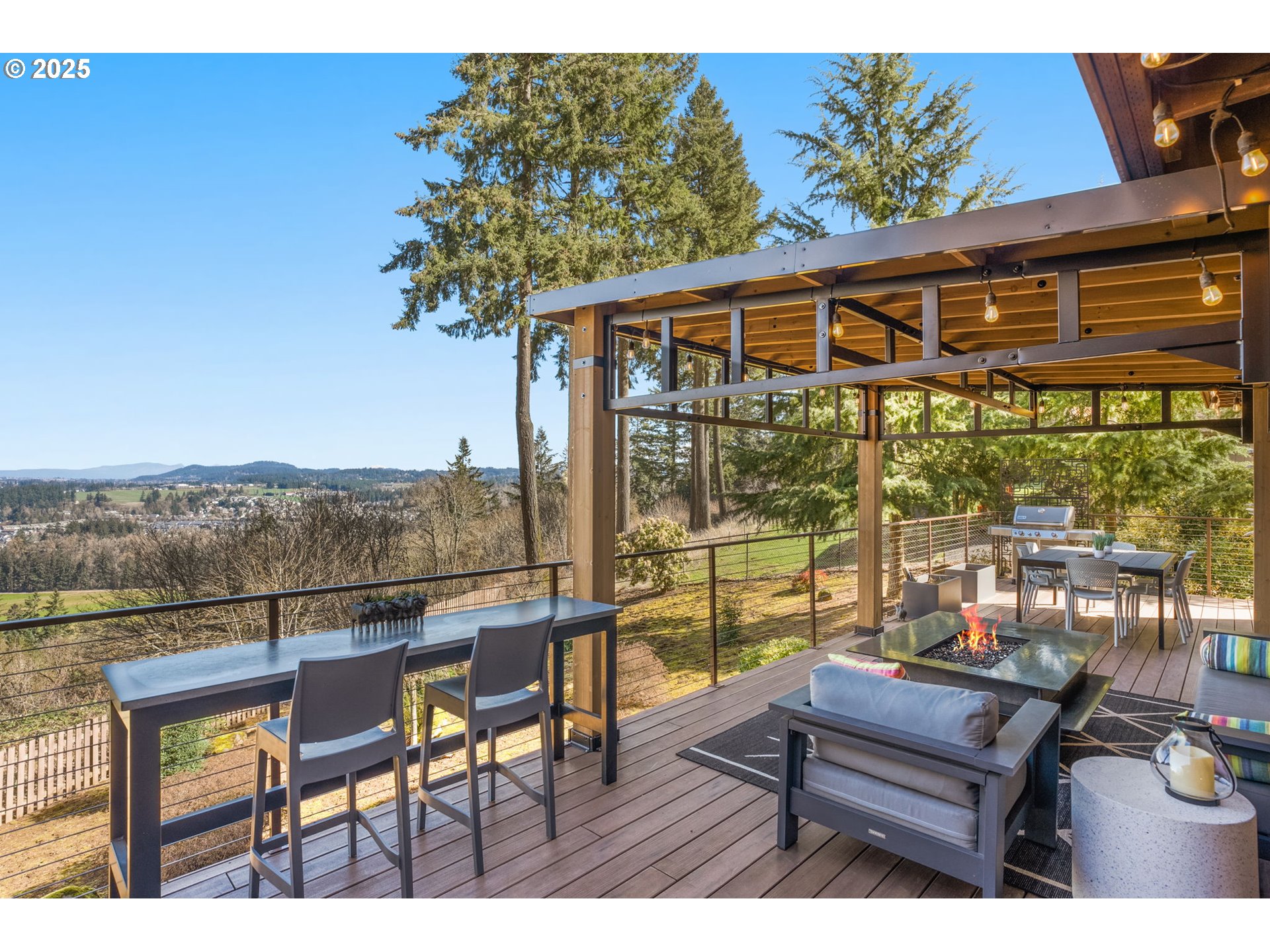17287 South Overlook Road Oregon City, OR 97045 - Photo 25 of 48 a view of a chairs and table in the patio