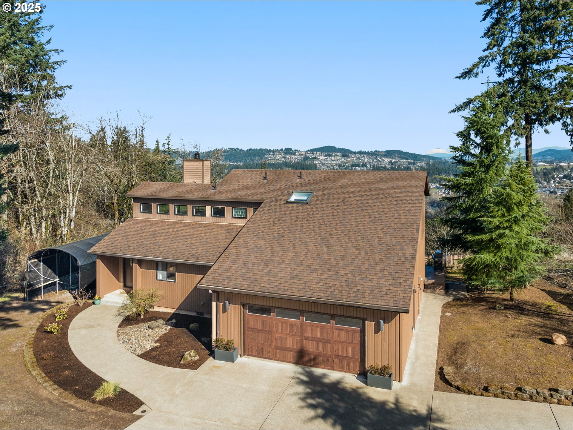 17287 South Overlook Road Oregon City, OR 97045 - Photo 3 of 48 an aerial view of a house with swimming pool and sitting space