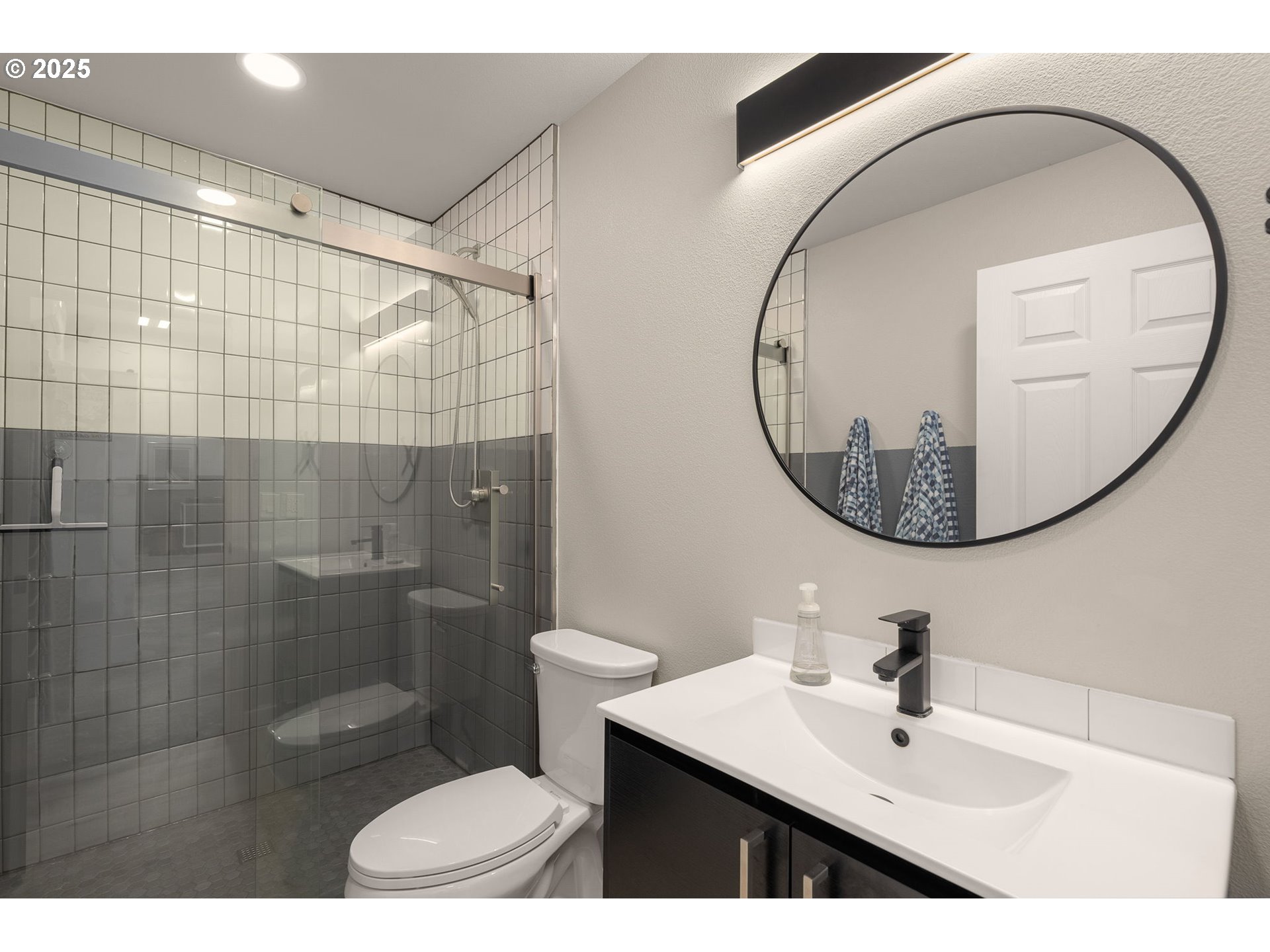 17287 South Overlook Road Oregon City, OR 97045 - Photo 37 of 48 a bathroom with a sink mirror toilet and shower