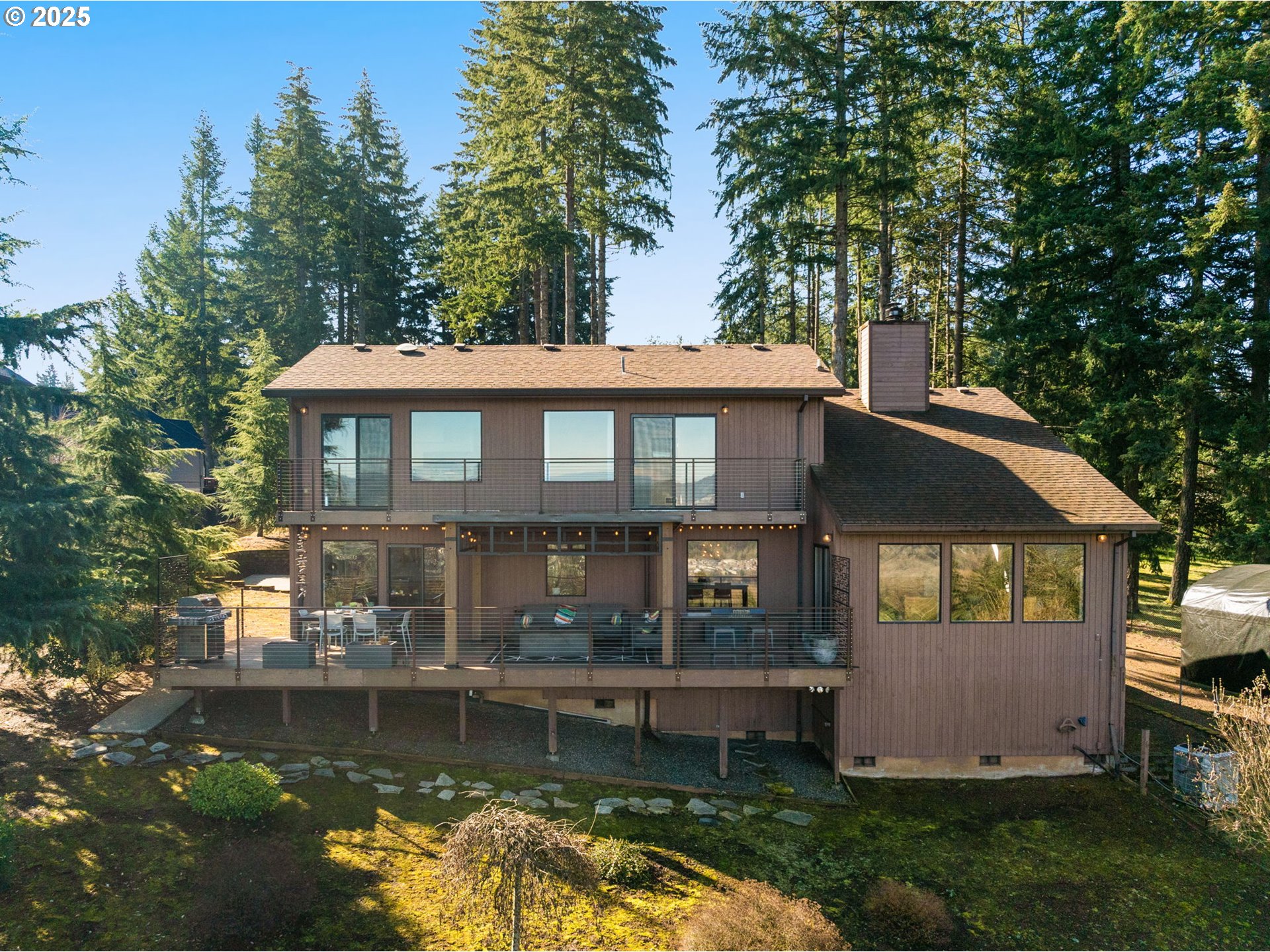 17287 South Overlook Road Oregon City, OR 97045 - Photo 43 of 48 a front view of a house with a garden and swimming pool