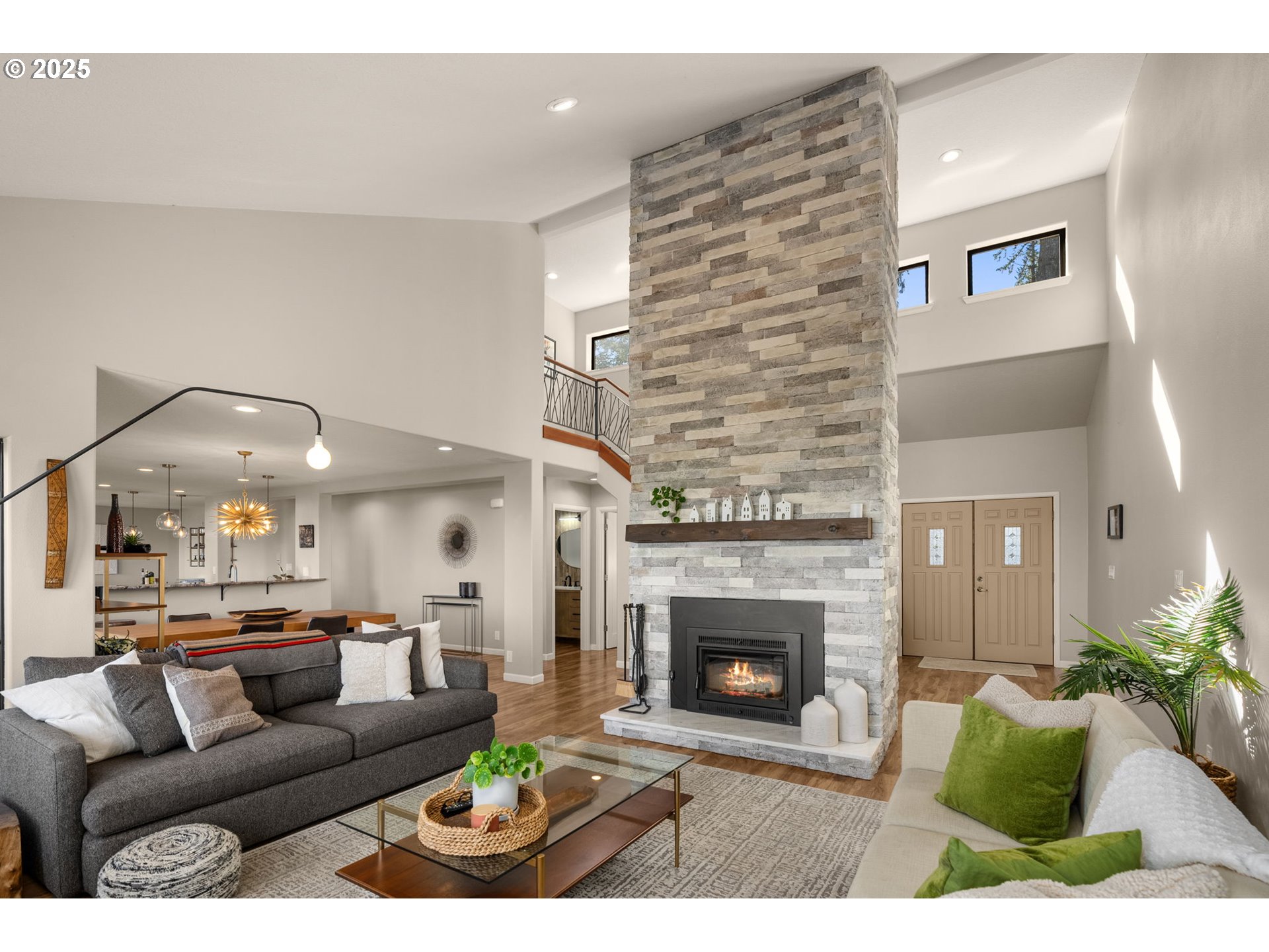 17287 South Overlook Road Oregon City, OR 97045 - Photo 9 of 48 a living room with furniture and a fireplace