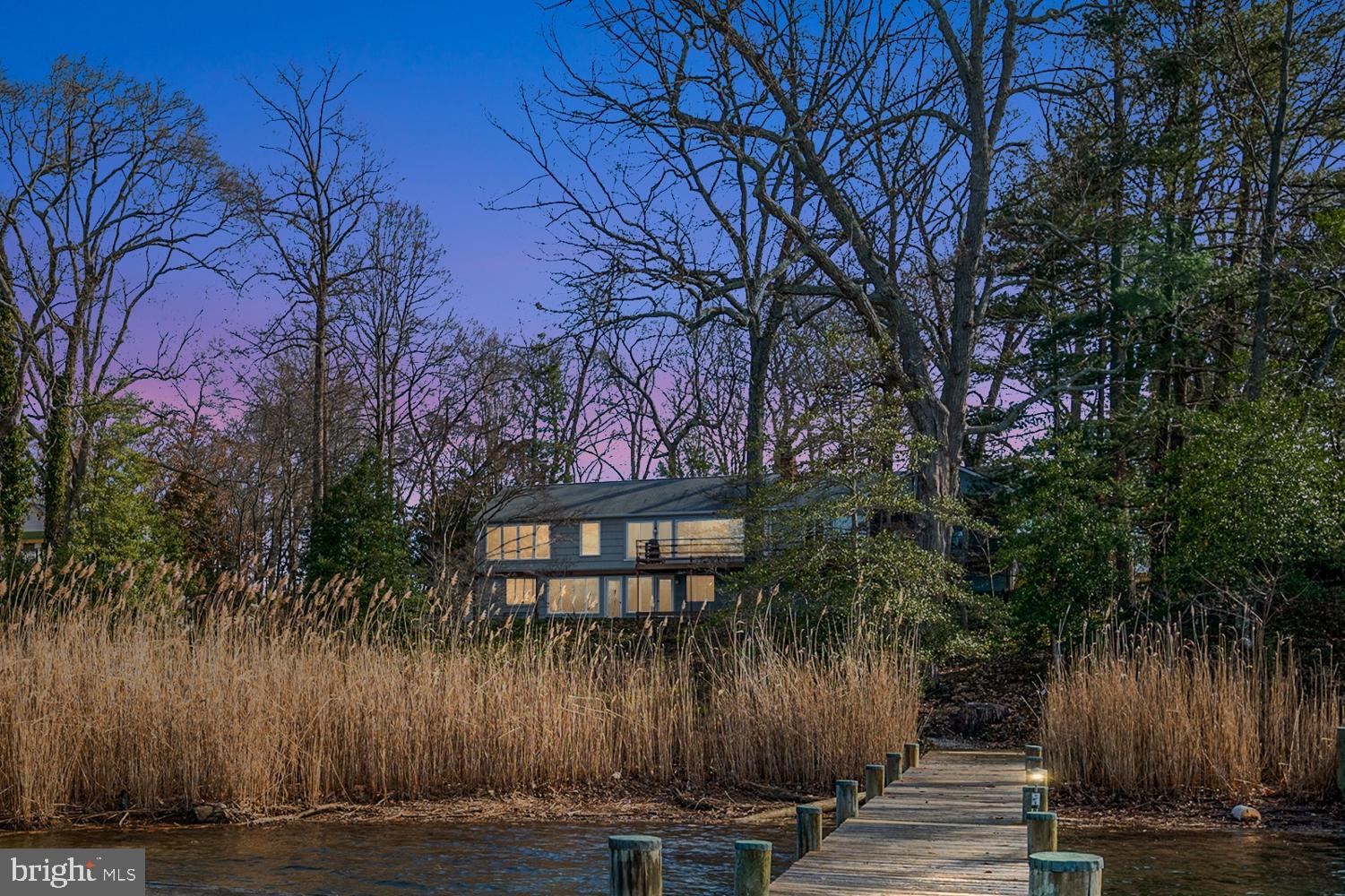 1910 Hidden Point Road Annapolis, MD 21409 - Photo 1 of 18 a front view of a house with a yard