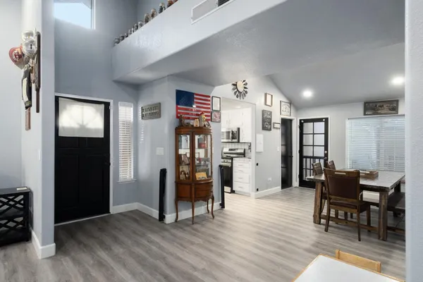 a view of a kitchen and dining room