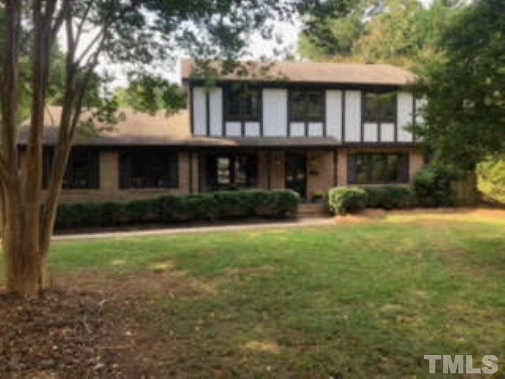 8709 Oneal Road Raleigh, NC 27613 - Photo 1 of 20 a front view of a house with garden