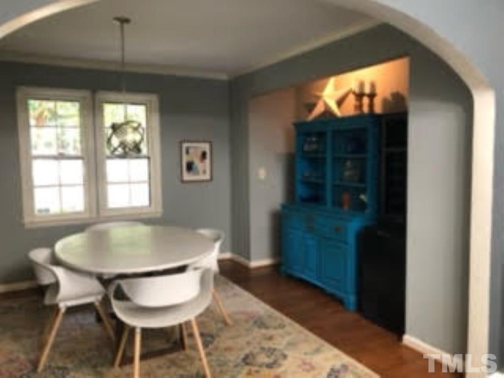 8709 Oneal Road Raleigh, NC 27613 - Photo 5 of 20 a dining room with furniture and window