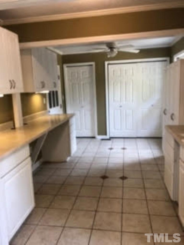 8709 Oneal Road Raleigh, NC 27613 - Photo 8 of 20 a view of kitchen with granite countertop lots of counter top space and cabinets