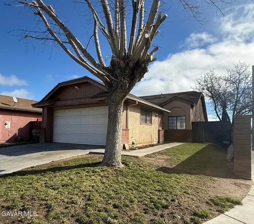 a house with trees in front of it