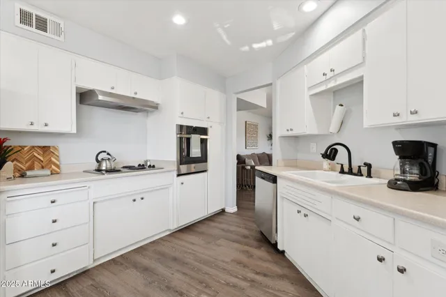 a view of a dining room with furniture and window