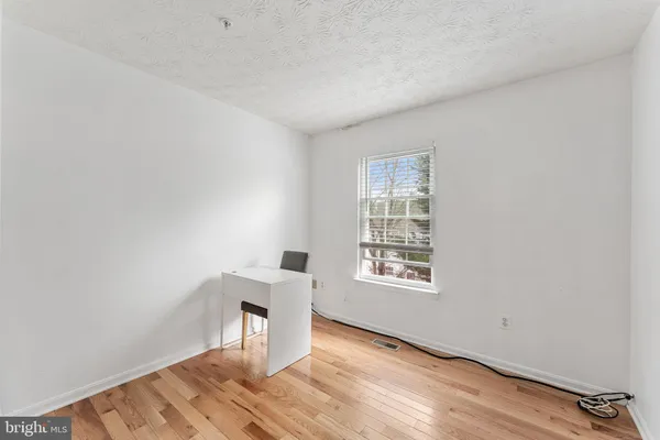 a workspace with wooden floor