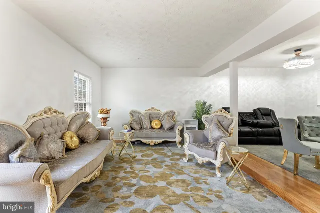 a living room with furniture and a couch