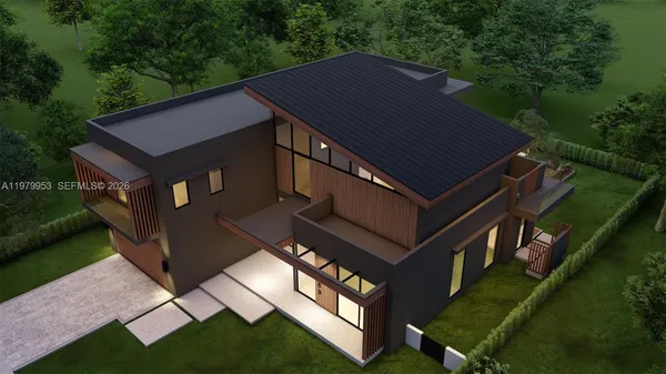 a aerial view of a house with a yard