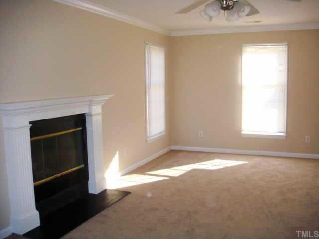 5905 Forest Ridge Drive Durham, NC 27713 - Photo 2 of 12 Spacious family room w/ slate surround FP, gorgeous mantle, crown molding, new carpet & paint.