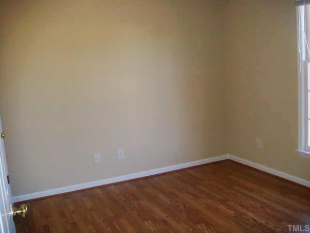 5905 Forest Ridge Drive Durham, NC 27713 - Photo 8 of 12 Secondary bedroom with 'Pergo' flooring.